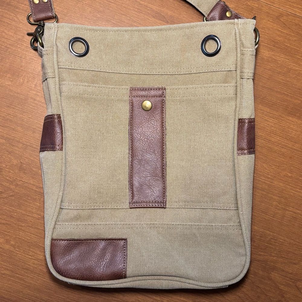 Canvas and faux leather bag with adjustable strap